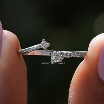 Open cuff wedding band with round clear moissanite accents and sparkling prong setting