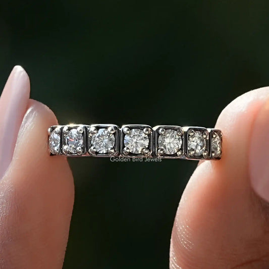 Seven-stone round moissanite band ring with prong-set stones, silver-tone