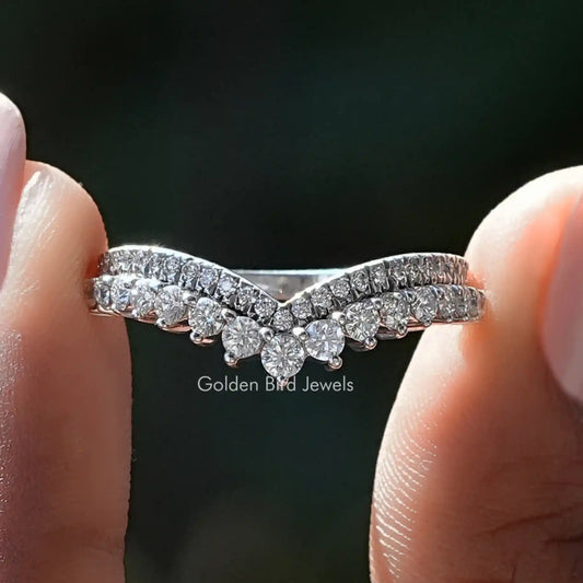Curved eternity band ring with round moissanite stones in silver setting