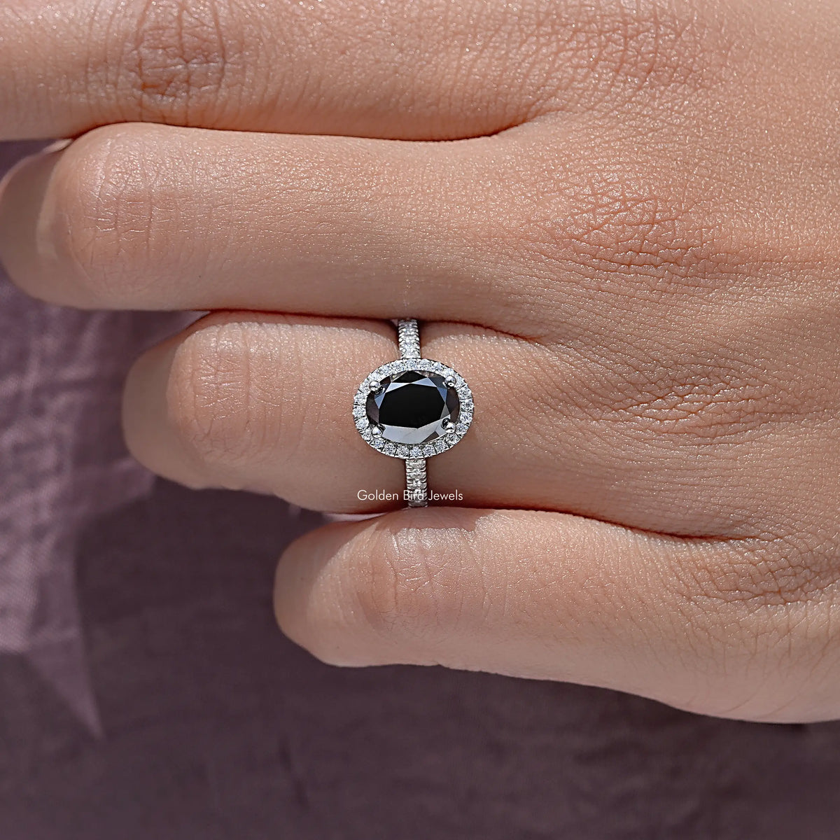 Oval black moissanite halo accent wedding ring in sterling silver