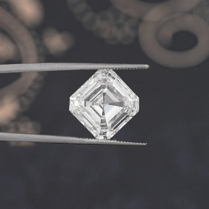 Asscher-cut lab-grown diamond in tweezers, clear step-cut stone