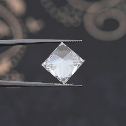 Princess-cut lab-grown diamond in metal tweezers, bright faceted stone