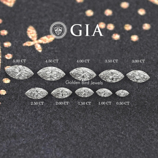 Marquise-cut lab diamonds arranged by size on a dark display surface