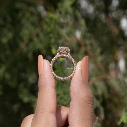 Halo bridal ring set with radiant-cut center stone and pavé band, side view