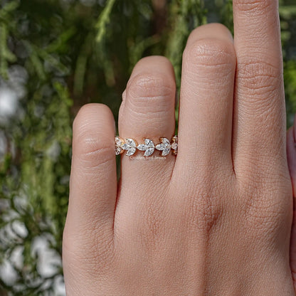 Dainty lab diamond wedding band with marquise stones, gold-tone band on hand