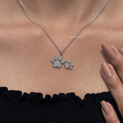 Paw-cluster pendant necklace with round-cut sparkling stones on silver-tone chain
