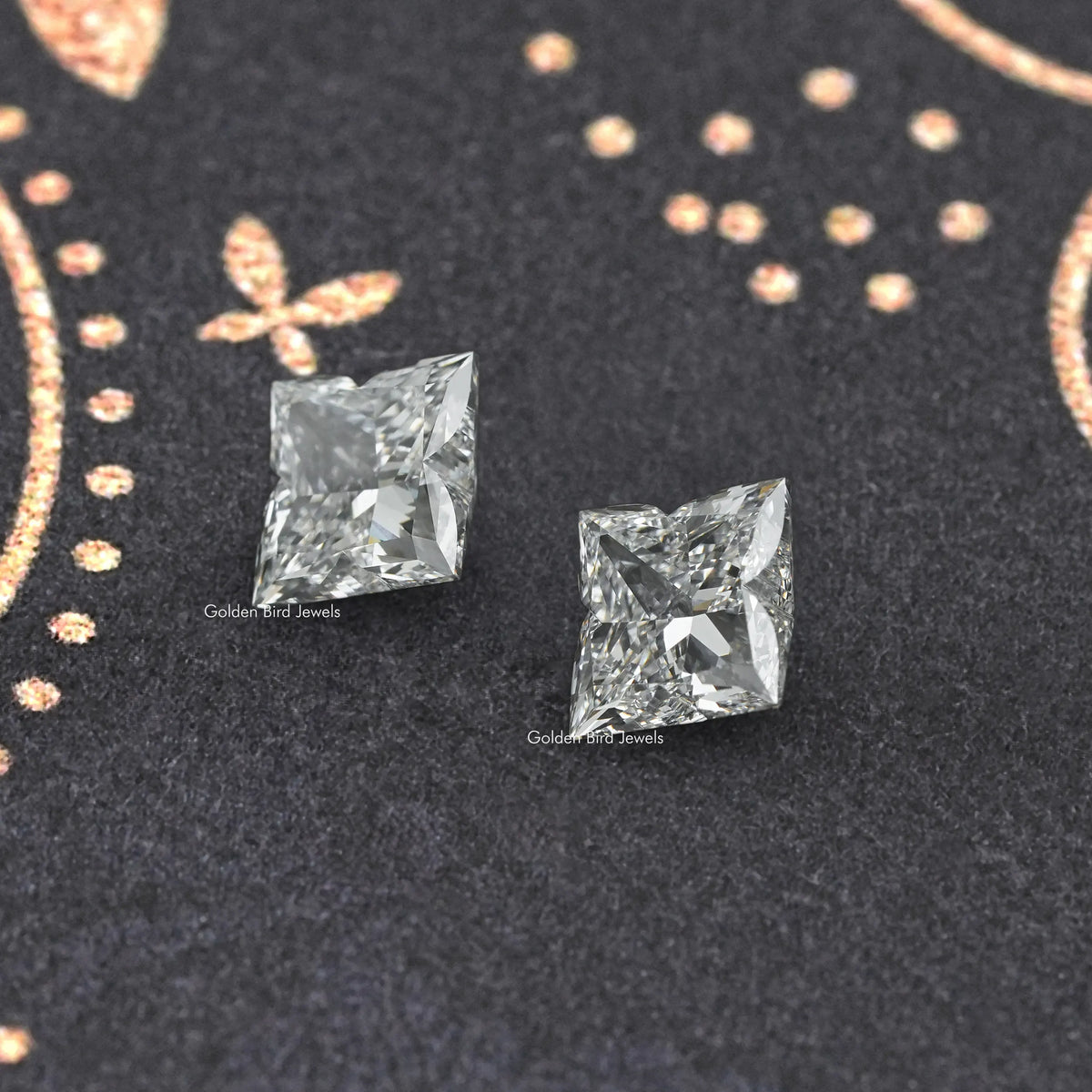 Pair of flower-cut lab-grown diamond stud earrings, angled view of two stones