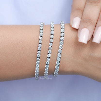 Round-cut lab diamond tennis bracelet in silver, three glittering rows with clasp