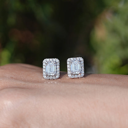 In Hand Front View Of Emerald Cut Diamond Stud Earring In White Gold