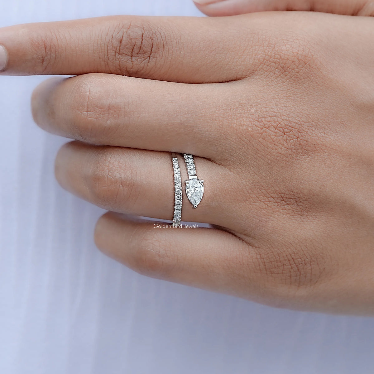 Detailed view of Pear And Round Cut Diamond Cuff Band