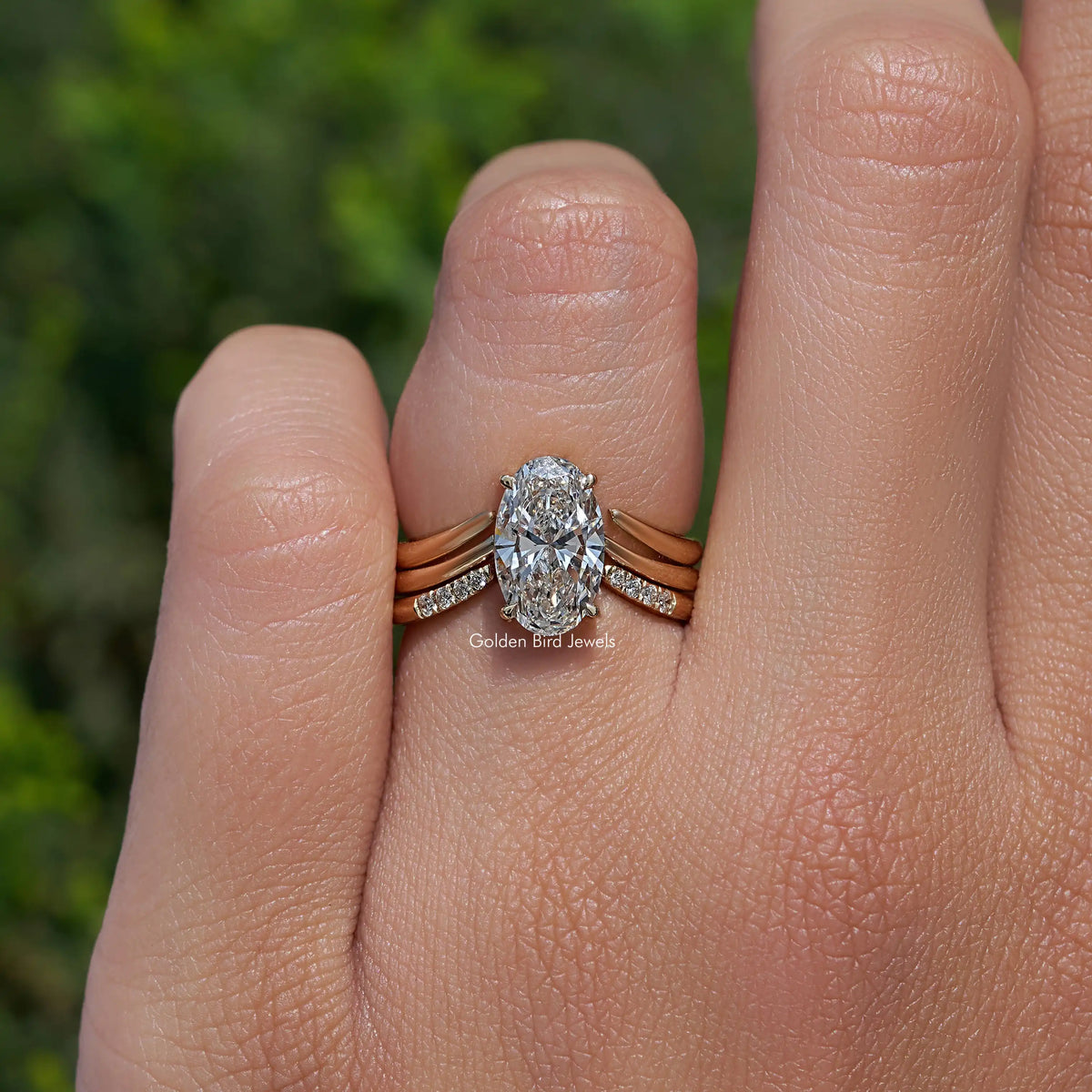 Oval lab diamond bridal ring with slim band and side accent stones