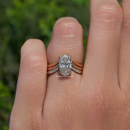 Oval lab diamond bridal ring with slim band and side accent stones