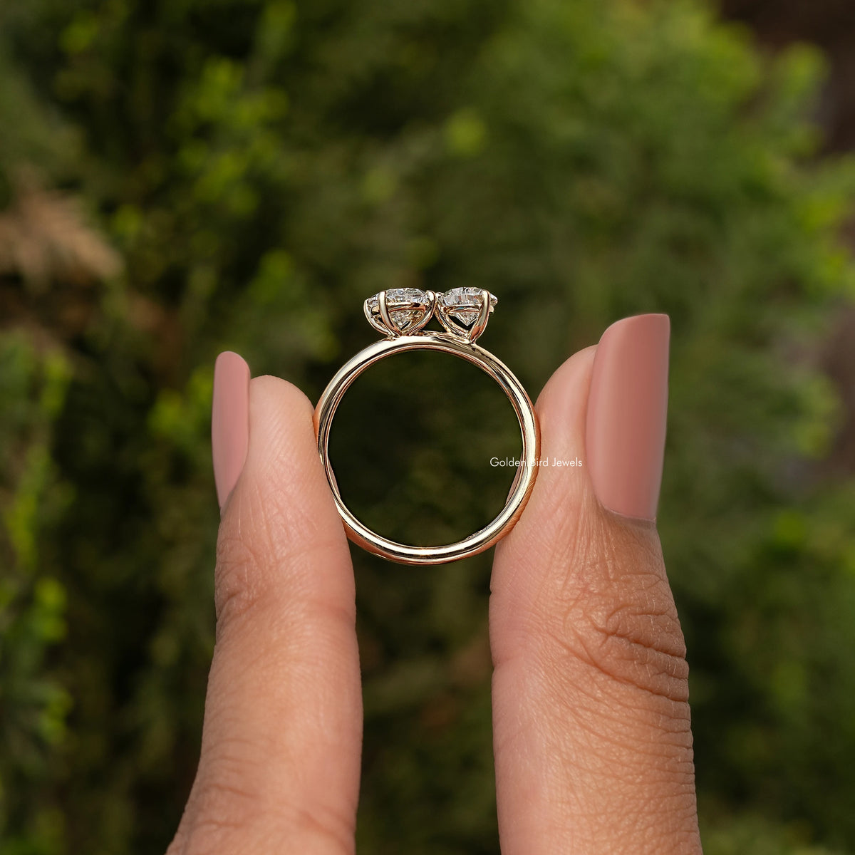 Gold toi et moi ring with oval and pear-cut lab diamonds, halo settings on split band