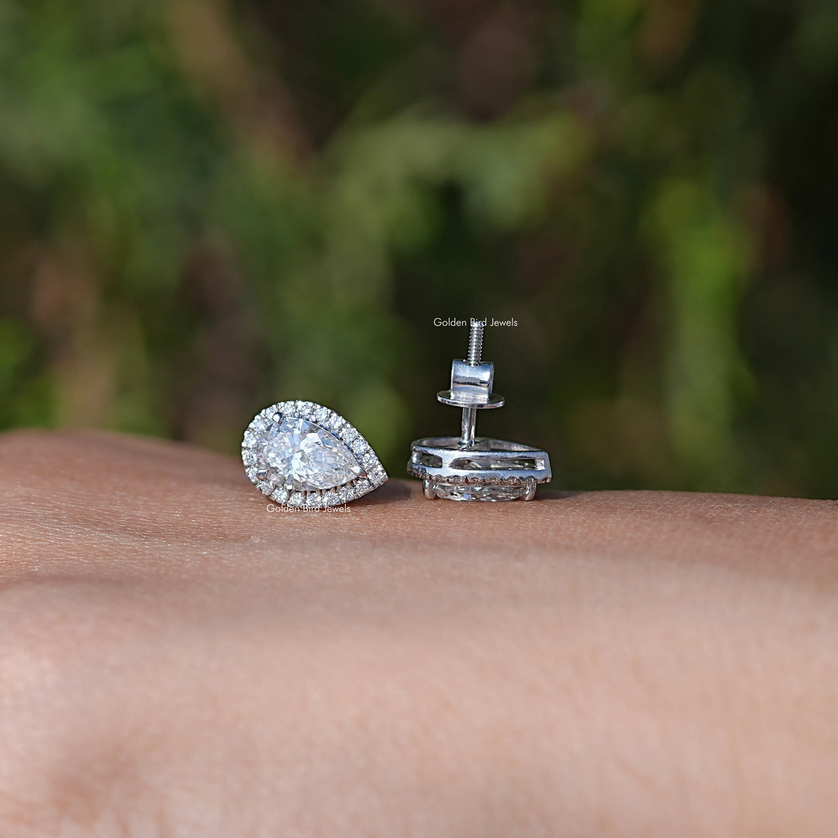 Front And Back Side View Of Solitaire Stud Earrings In Women's