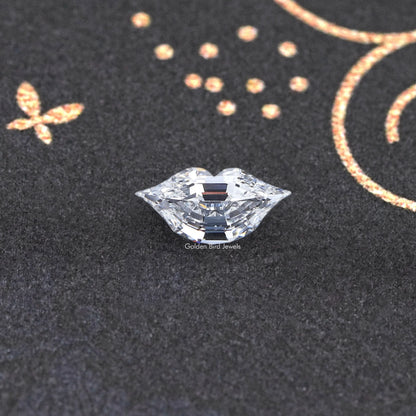 Marquise-cut lab-grown diamond top view on textured surface