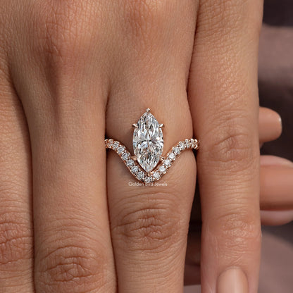 Marquise-cut lab-grown diamond curved accent ring on a finger