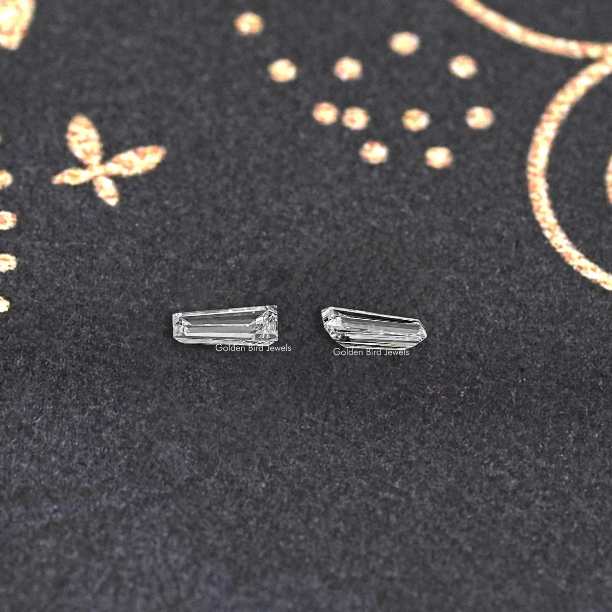 Pair of baguette-cut lab diamond earrings with rectangular stones in prong settings