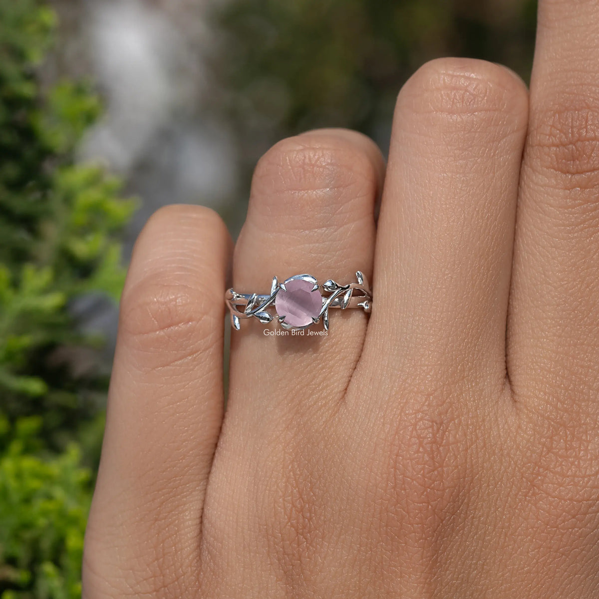 Rose quartz round gemstone solitaire ring, leaf motif in 925 Argentium silver