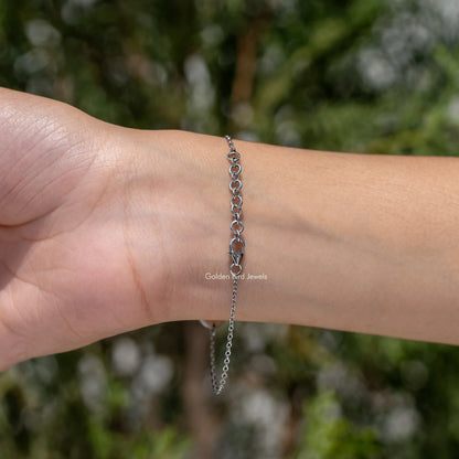 Sterling silver bracelet with round light blue initial A charm and dark blue gemstone