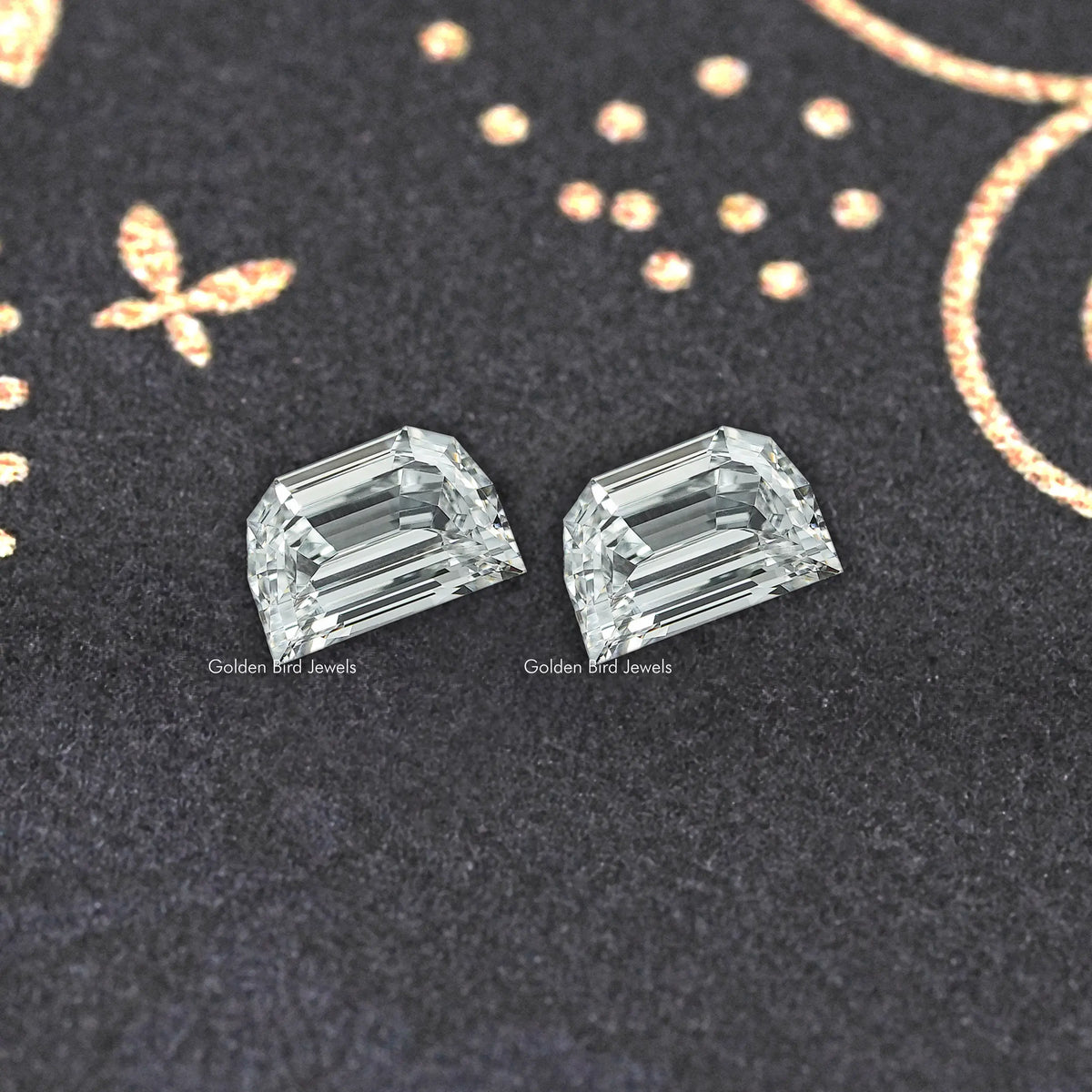 Pair of step-cut lab-grown diamonds, rectangular emerald cuts angled for sparkle