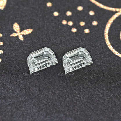 Pair of step-cut lab-grown diamonds, rectangular emerald cuts angled for sparkle