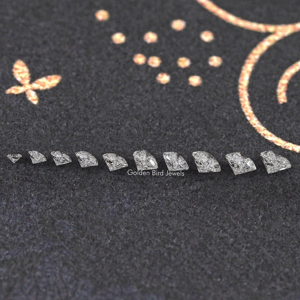Row of small heart-shaped lab diamonds, faceted sparkle in a line