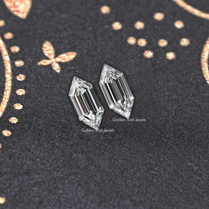 Boat-cut lab-grown diamond stud earrings, angled view of rectangular stones