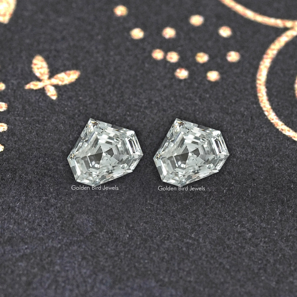 Pair of octagonal step-cut lab-grown diamonds with bright facet highlights
