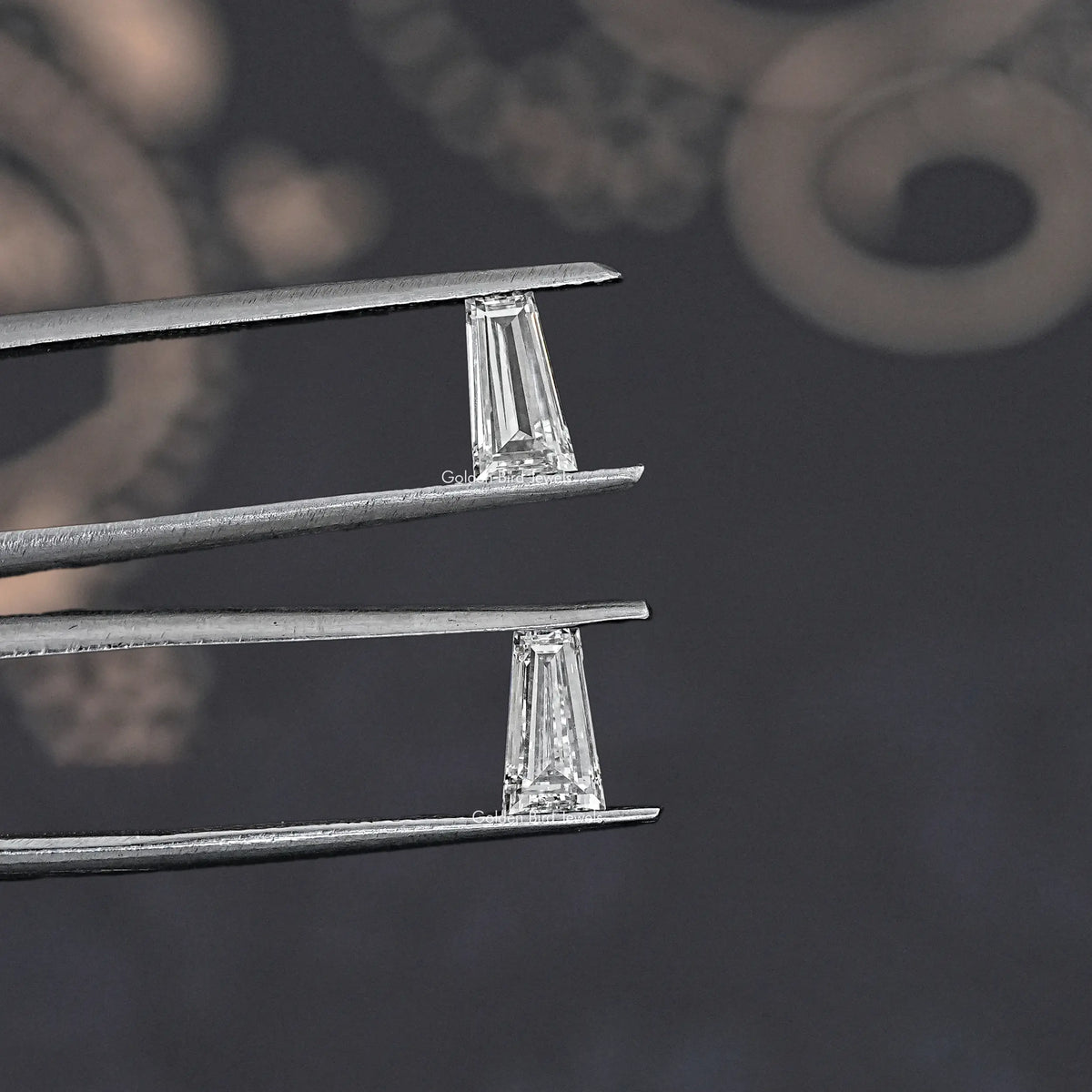 Baguette-cut lab diamond earrings, rectangular stones shown in side prong settings