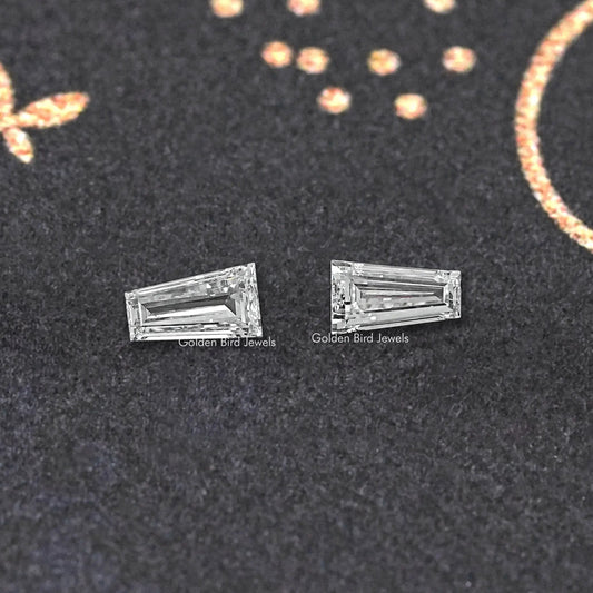 Pair of baguette-cut lab diamond studs with clear rectangular stones, symmetrical