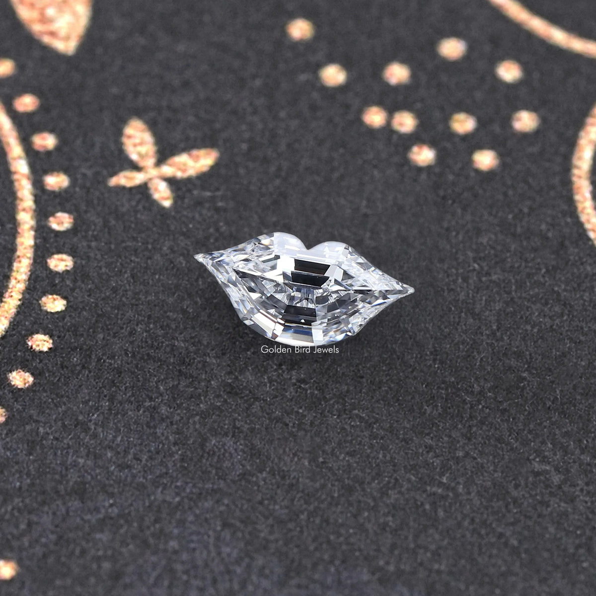 Marquise-cut lab-grown diamond on textured surface, crisp detailed facets