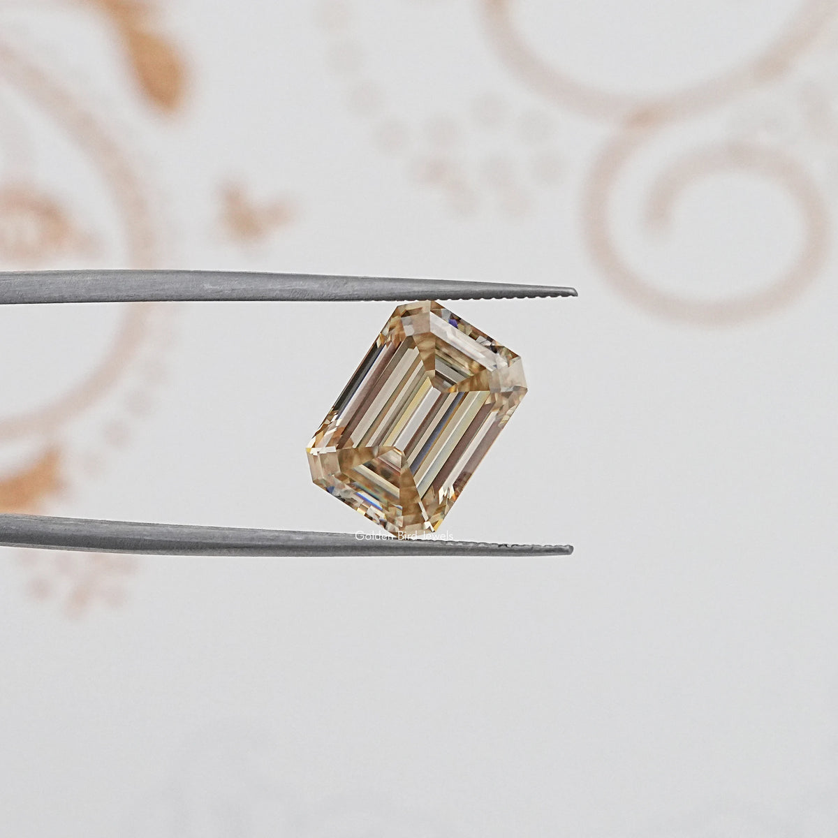 In Tweezer View Of Old Mine Emerald Cut Loose Moissanite Stone