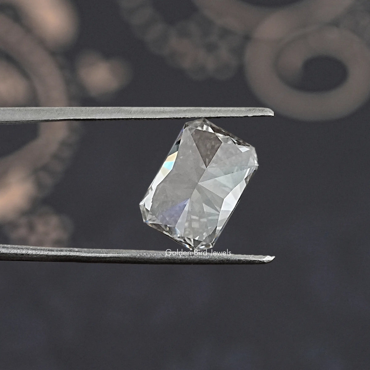 Loose radiant-cut lab diamond with angled view, clear sparkling facets