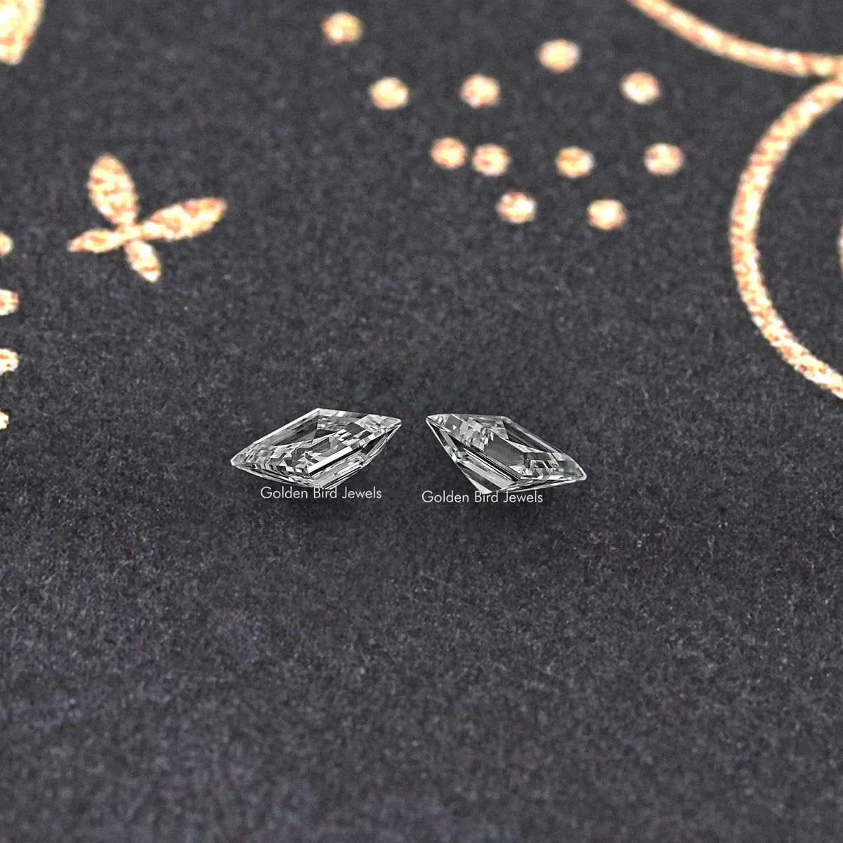Pair of lozenge-cut lab-grown diamonds, clear stones shown side-by-side.