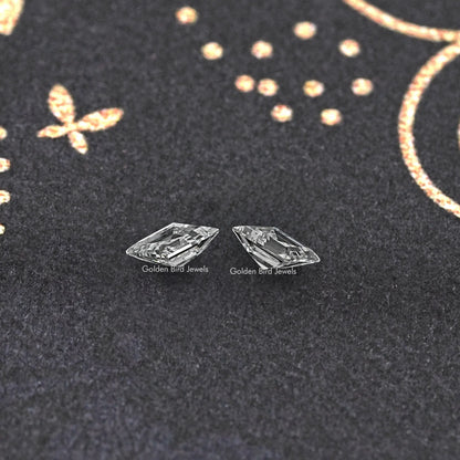 Pair of lozenge-cut lab-grown diamonds, clear stones shown side-by-side.