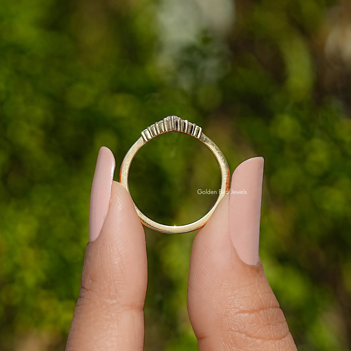 Yellow gold chevron V moissanite ring from the back, open band view