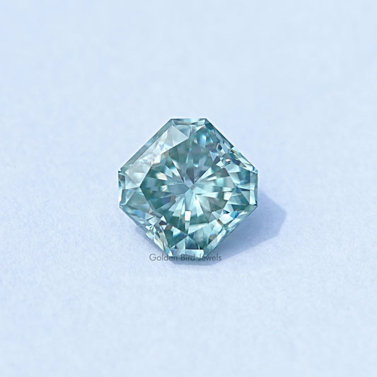 Loose square radiant-cut moissanite gemstone, light blue-green facets