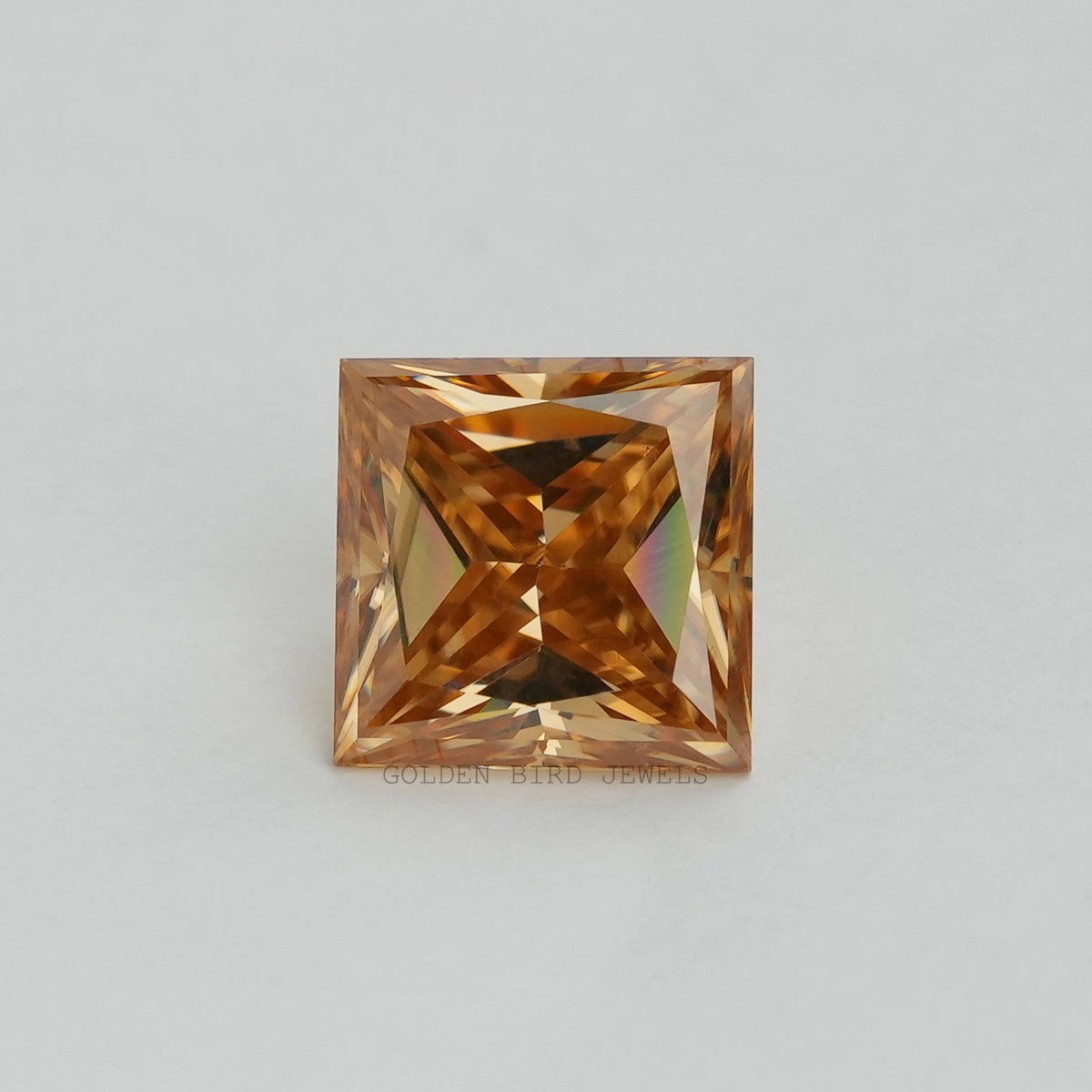 Princess-cut loose moissanite gemstone, golden-brown square stone with faceted sparkle
