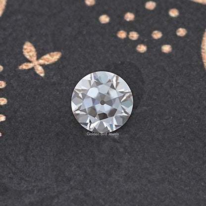 Round faceted moissanite gemstone with a bright, prismatic sparkle