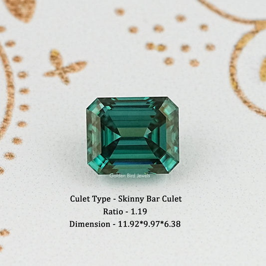 Emerald-cut green moissanite gemstone with faceted rectangular step design