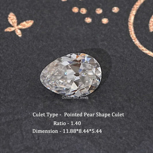 Loose pointed pear-cut moissanite gemstone with sparkling facets.