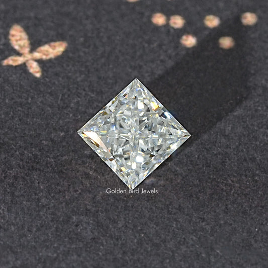Princess-cut moissanite loose stone, close-up clear square with high-contrast facets.