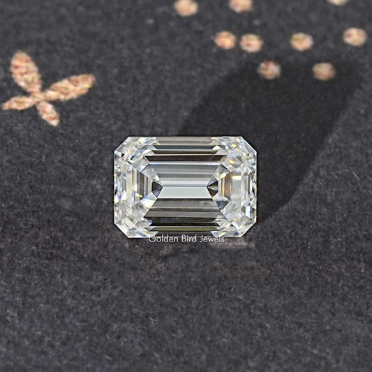 Near colorless emerald-cut moissanite loose stone, symmetrical rectangular step-cut