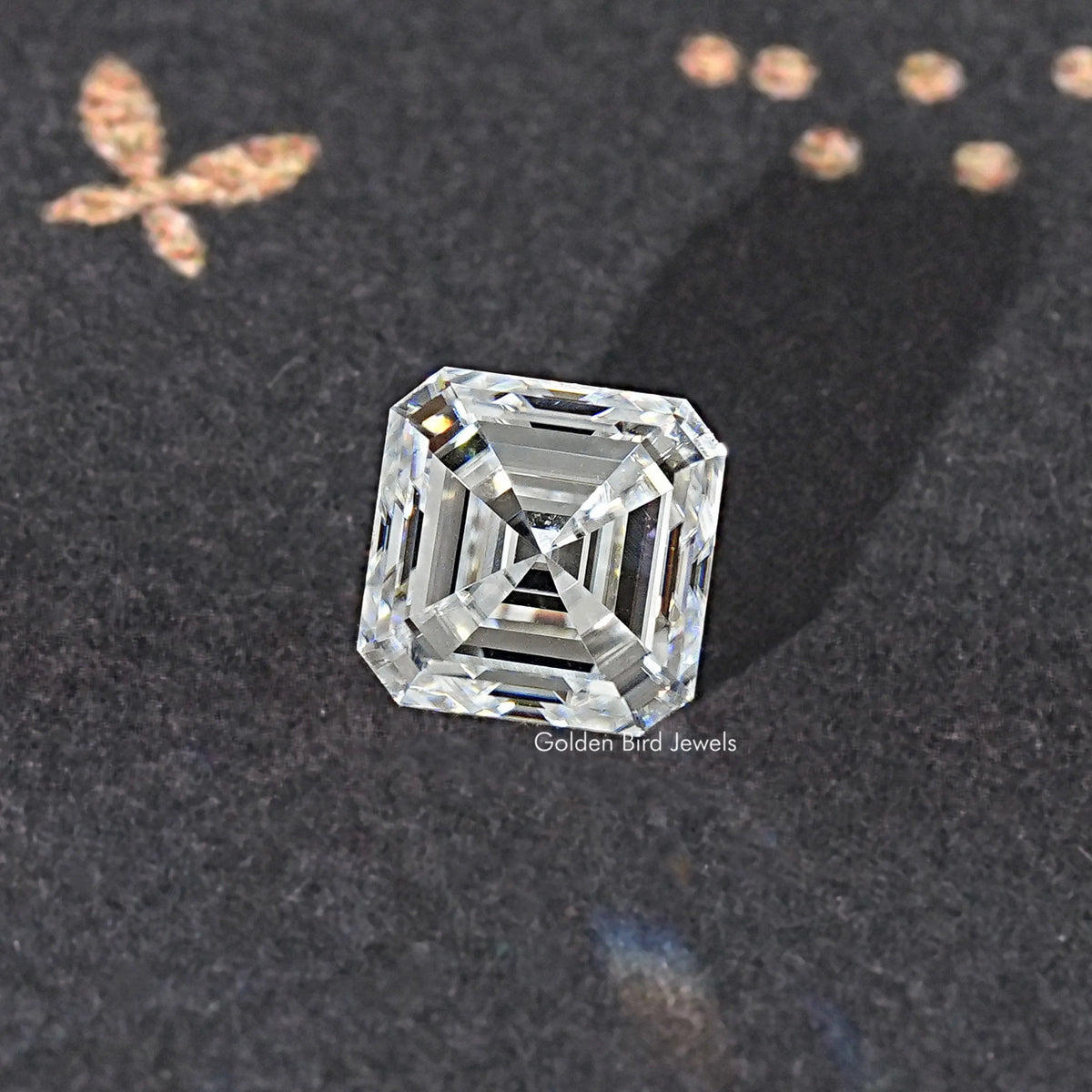 Asscher-cut colorless moissanite loose stone, three-quarter view of step facets