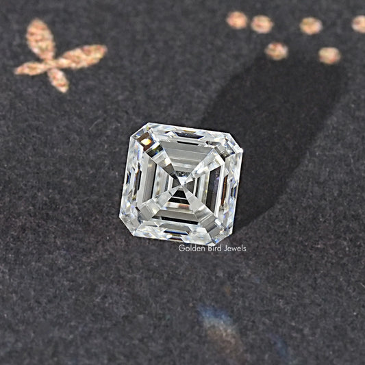 Asscher-cut colorless moissanite loose stone, three-quarter view of step facets