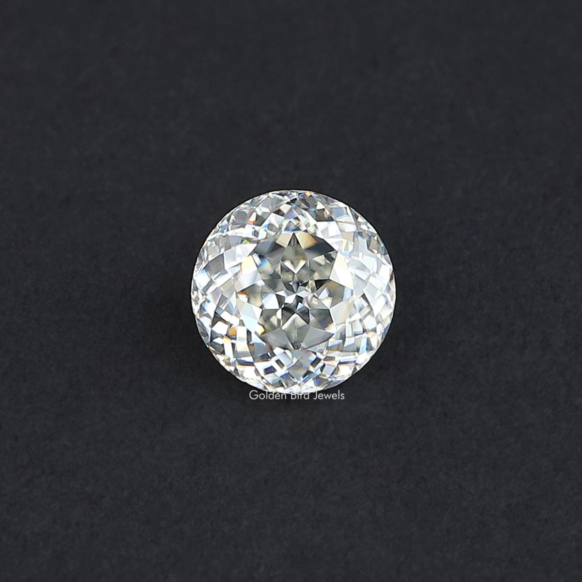 Round moissanite gemstone with antique cut facets