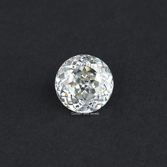 Round moissanite gemstone with antique cut facets