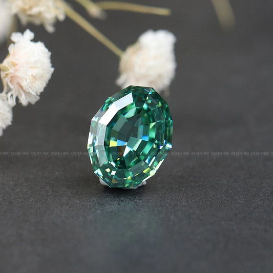 Green step-cut oval moissanite gemstone with faceted surface