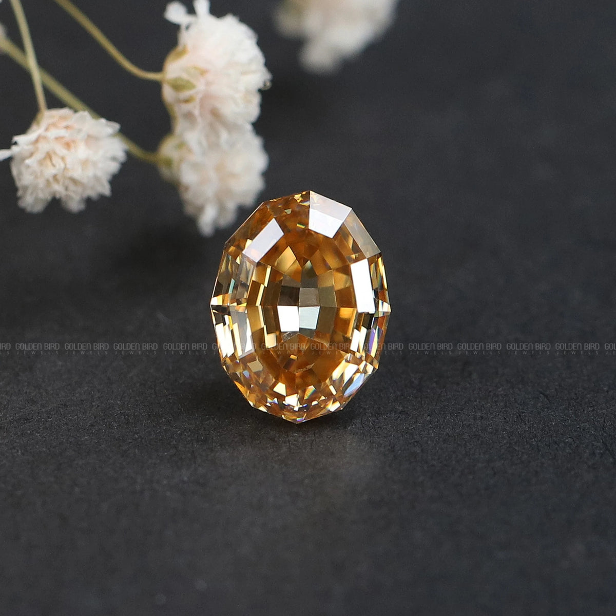 Champagne oval step-cut moissanite loose gemstone, faceted golden-brown sparkle