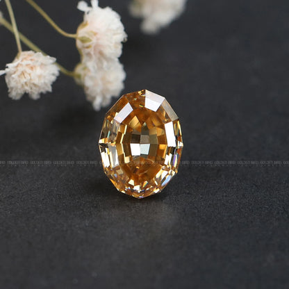 Champagne oval step-cut moissanite loose gemstone, faceted golden-brown sparkle